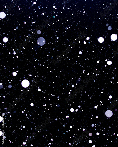 abstract texture background of snow falling at night.