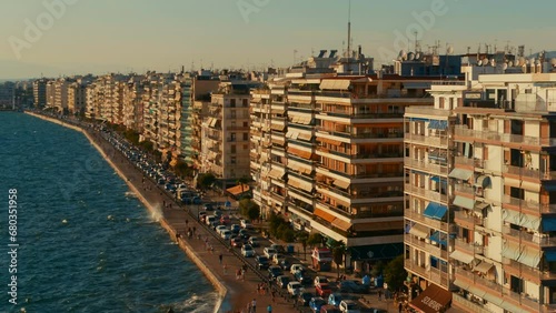 Aerial panning view of the Nikis Avenue, aka Nikes Avenue, the central waterfront avenue and the famous sea port in Thessaloniki, Greece. photo