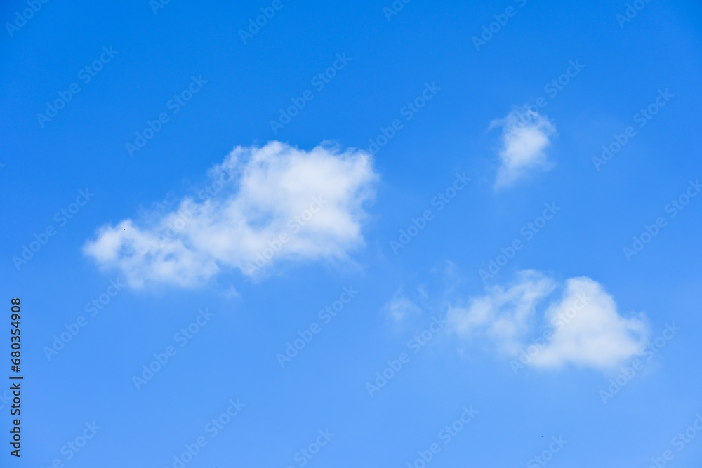 beautiful blue sky and white fluffy group of clouds with sunrise in the morning, natural background beautiful blue sky and white fluffy group of clouds with sunrise in the morning, natural background