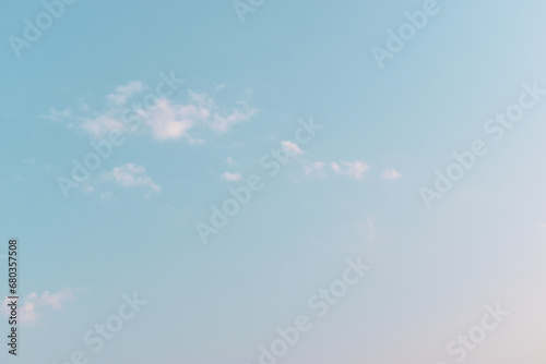 beautiful blue sky and cloud with golden ray sunrise in the morning, natural background