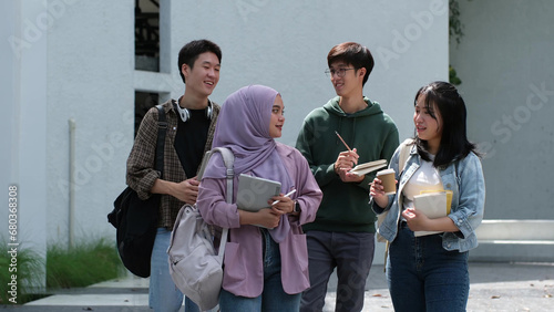 Billede på lærred Student friendship concept with multiracial diverse classmate friend sitting together at campus college park