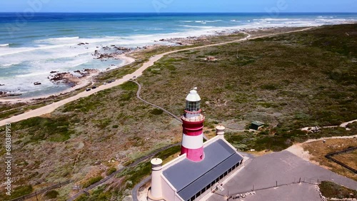 Historic Cape Agulhas lighthouse beacon for mariners on South African coastline