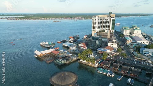 Aerial establishing shot of the seafest square with a busy waterway in semporna photo