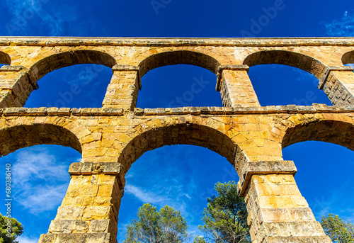 Photography The Ferreres Aqueduct, also known as the Pont del Diable, is an ancient Roman br
