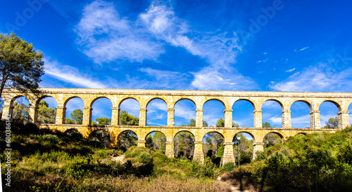 Obraz na płótnie The Ferreres Aqueduct, also known as the Pont del Diable, is an ancient Roman bridge in Tarragona in Catalonia, Spain w salonie