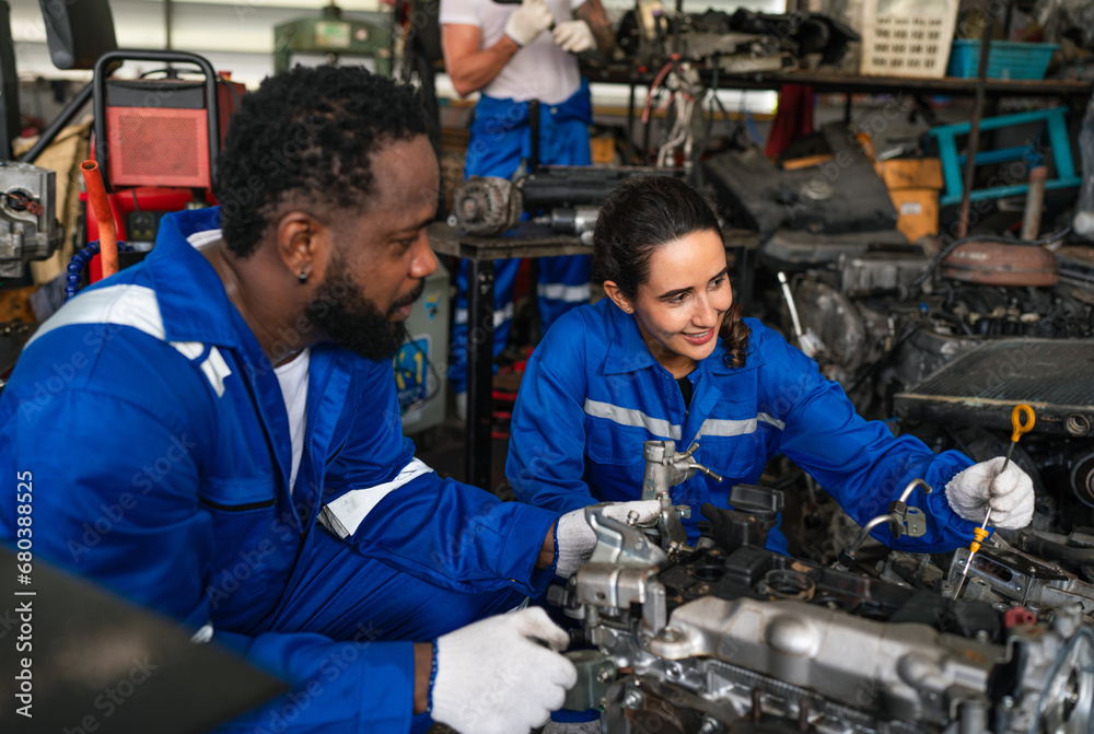 Auto mechanic are repair and maintenance auto engine is problems at car repair shop. Auto mechanic are repair and maintenance auto engine is problems at car repair shop.
