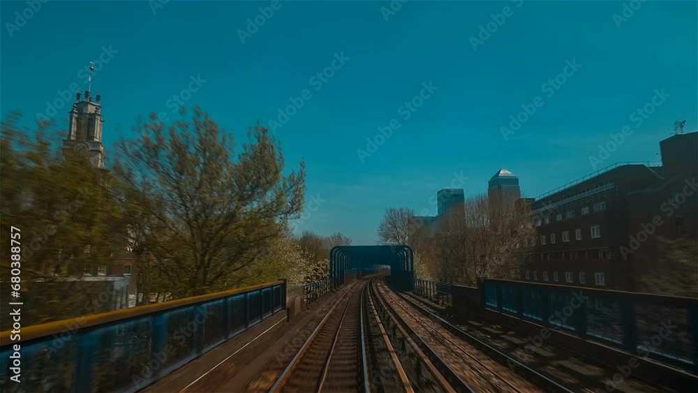 Drivers seat view of a DLR train journey across several points of interest in the financial district of London, England, UK Drivers seat view of a DLR train journey across several points of interest in the financial district of London, England, UK