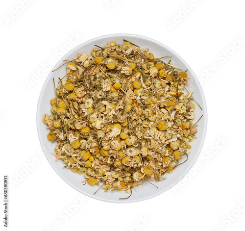 flat lay top view dry chamomile camomile flower leaves isolated in white bowl background. pile of dry chamomile camomile flower leaves isolated. dry chamomile or camomile flower leaves for healthy tea