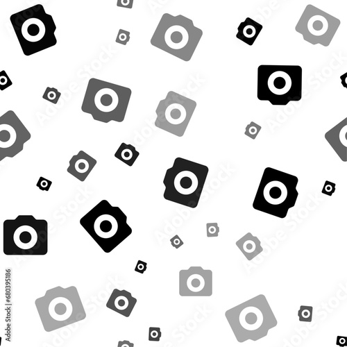 Seamless vector pattern with photo camera symbols, creating a creative monochrome background with rotated elements. Vector illustration on white background