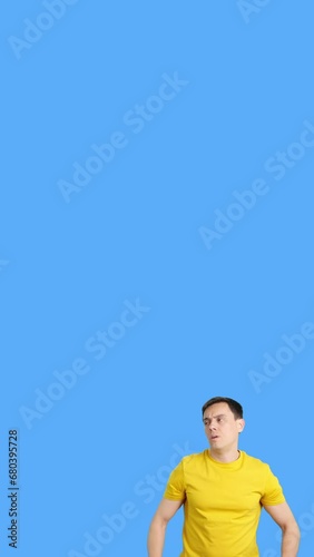 Angry man pointing to the blank space aside