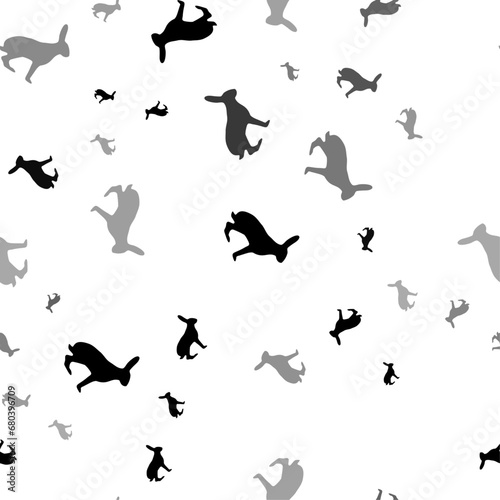 Seamless vector pattern with hare symbols, creating a creative monochrome background with rotated elements. Vector illustration on white background