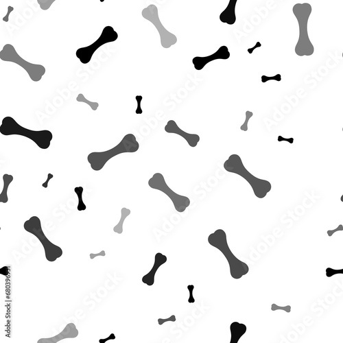 Seamless vector pattern with dog bone symbols, creating a creative monochrome background with rotated elements. Illustration on transparent background