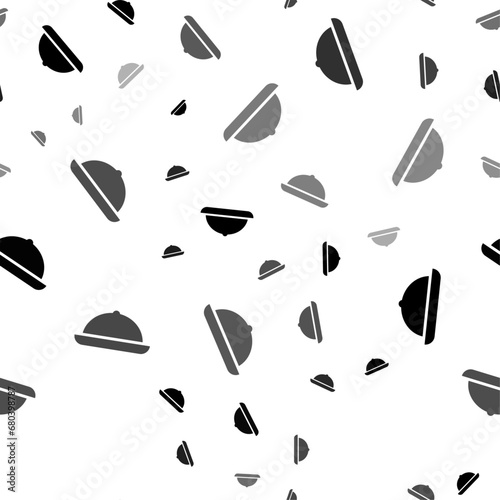 Seamless vector pattern with cloche symbols, creating a creative monochrome background with rotated elements. Vector illustration on white background