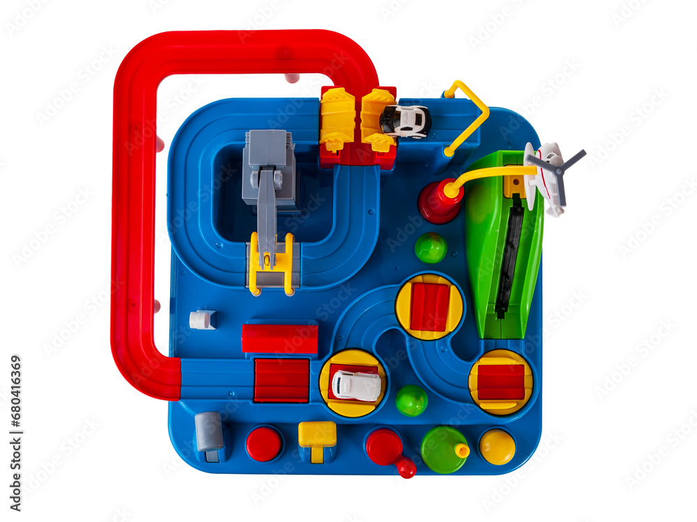Children's toy slide with obstacles for passing cars along the road toys for kids isolated on a white background Children's toy slide with obstacles for passing cars along the road toys for kids isolated on a white background