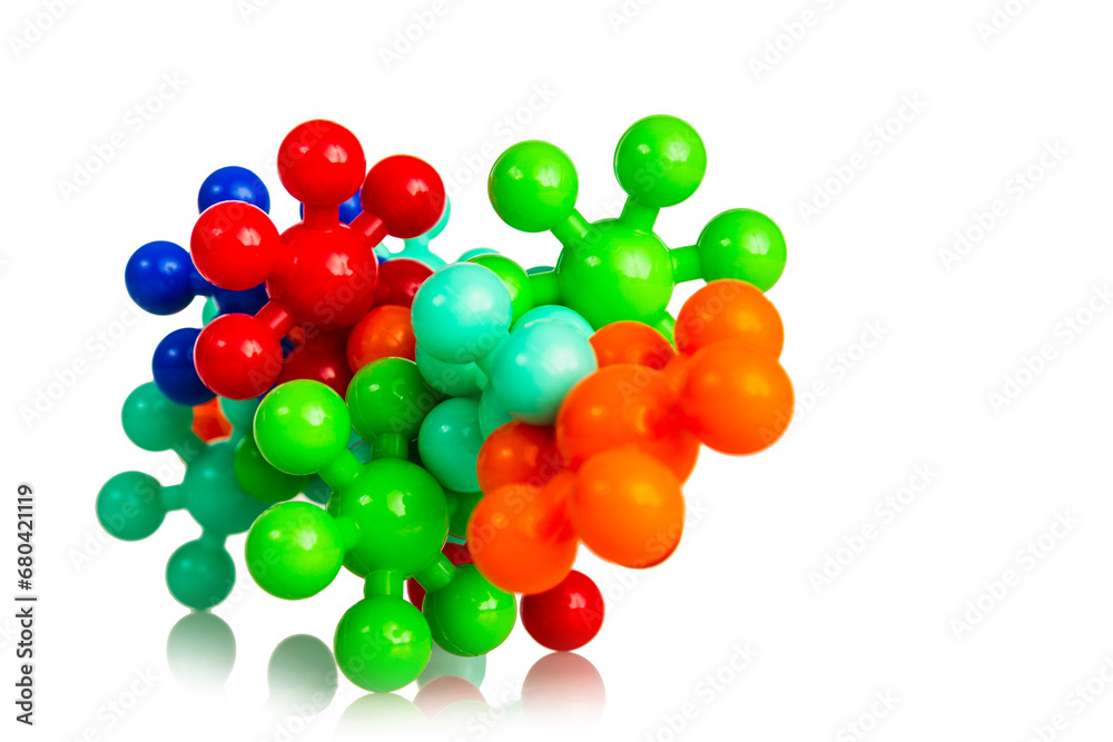 Plastic model of chemical elements of protein molecules, isolated on white background, close up Plastic model of chemical elements of protein molecules, isolated on white background, close up