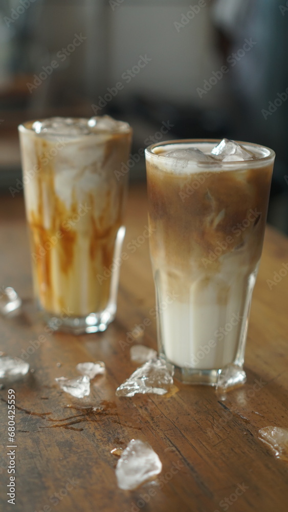 Coffee Latte Ice served on the wooden table. Coffee Latte Ice served on the wooden table.