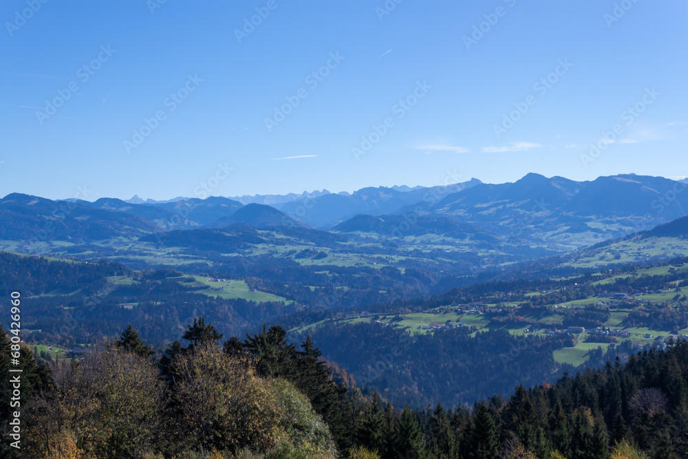 Beautiful green Alp mountains and hills from Pfaender Mountain in Bregenz