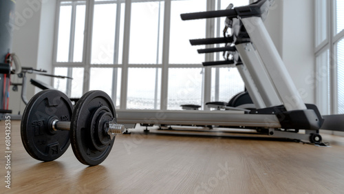 dumbbells in the gym, the concept of a healthy lifestyle