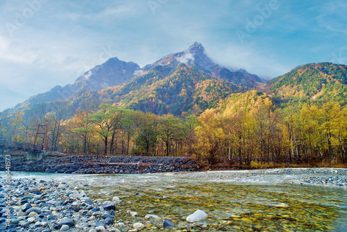 Kamikochi National Park in the Northern Japan Alps of Nagano Prefecture, Japan. Beautiful mountain in autumn leaf and Azusa river