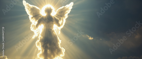 Angel cloud with bright light rays in the sky