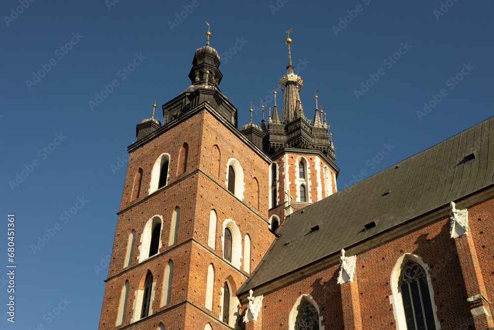 St. Marys Basilica at the Main Square in the Old Town, Krakow, Poland. Detail of domes of Gothic Saint Mary Basilica. Traveling Europe