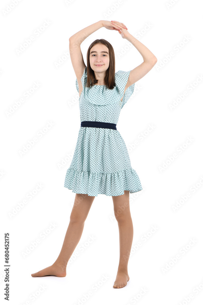 Young beautiful girl in a dress with polka dots on a white background. Young beautiful girl in a dress with polka dots on a white background.