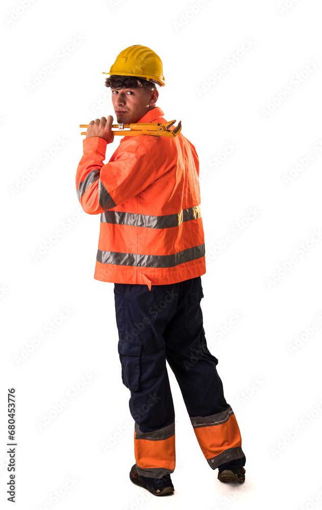 A man in an orange safety jacket holding a wrench