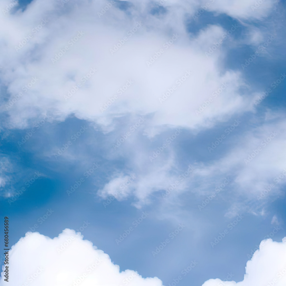 Obraz premium Soft and fluffy white clouds on a blue sky background Natural and calming Ideal for creating a serene and peaceful atmosphere in designs