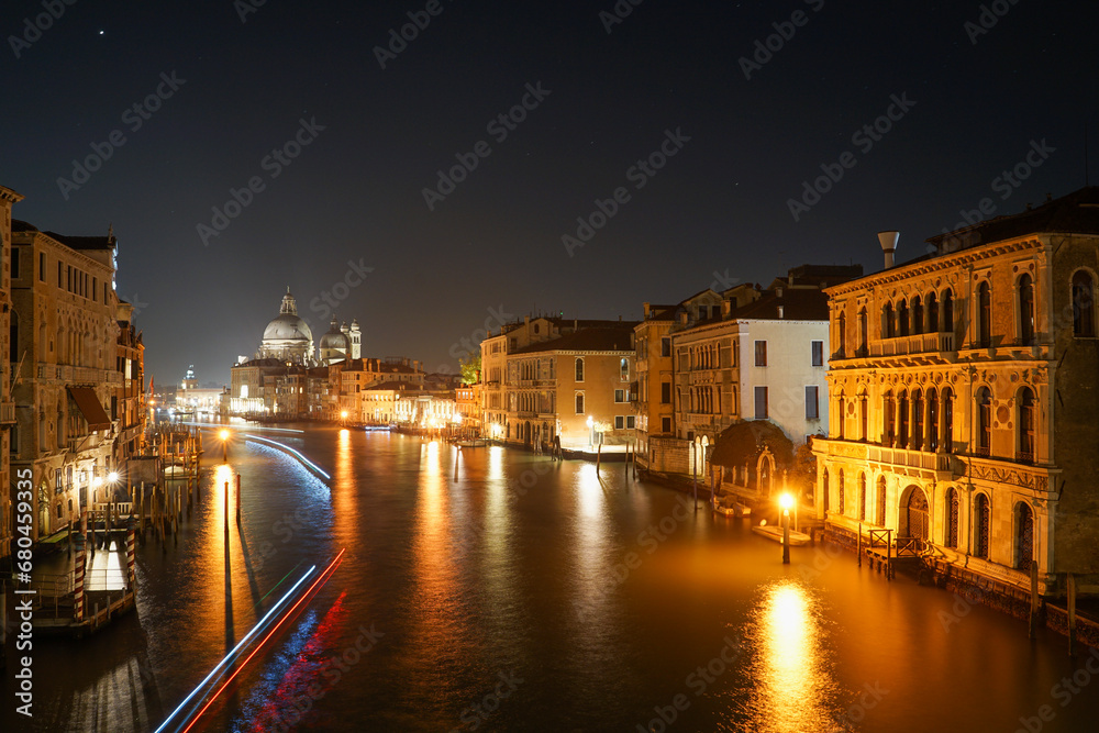 View of the Grand Canal and Basilica Santa Maria della Salute at night, Venice, Italy