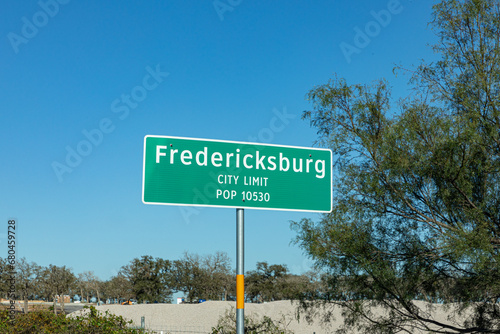 welcome sign in Fredericksburg with city limit and pupulation, Fredericksburg, Texas photo