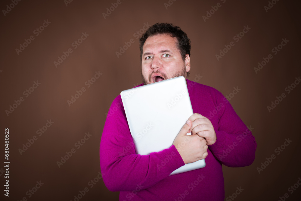 A funny fat man dreams of a vacation and books a tour on the Internet. A funny fat man dreams of a vacation and books a tour on the Internet.