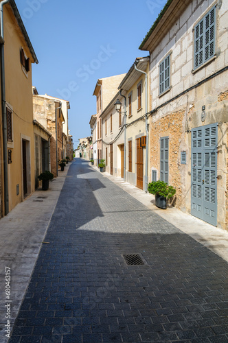 Window shutters areclosed  in an empty street, Sant Llorenc, Mallorca/Majorca © Stephen
