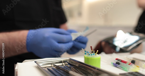Protaper needles that a nurse prepares for use by a doctor in dentistry. photo