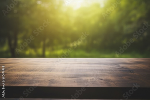 a dark wooden table top with a blurred green tropical forest background and warm light flare.