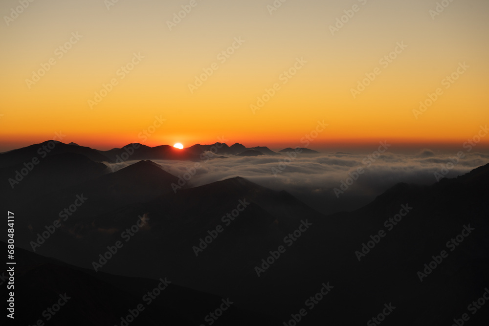 Sea of ​​clouds during sunset in the Tatra National Park