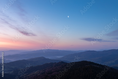 Fototapeta Naklejka Na Ścianę i Meble -  Amazing colors of the sky during sunrise admired in the Beskids