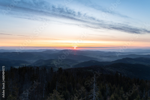 Fototapeta Naklejka Na Ścianę i Meble -  Sunset over the forested hills of the Beskids