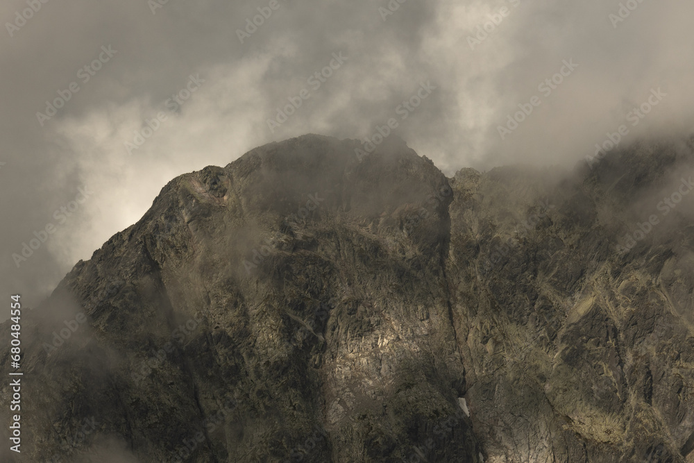 The Slovak High Tatras covered in clouds - obrazy, fototapety, plakaty 
