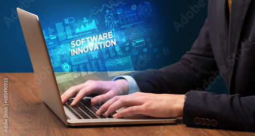 Wallpaper Mural Businessman working on laptop concept Torontodigital.ca