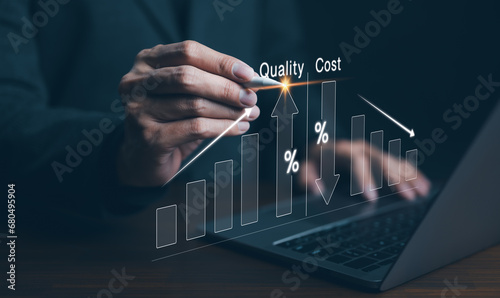 Quality increase and cost optimization for products or services to improve efficiency. Businessman use computer with quality control growth graph and cost reduction, Effective business, Efficient Risk