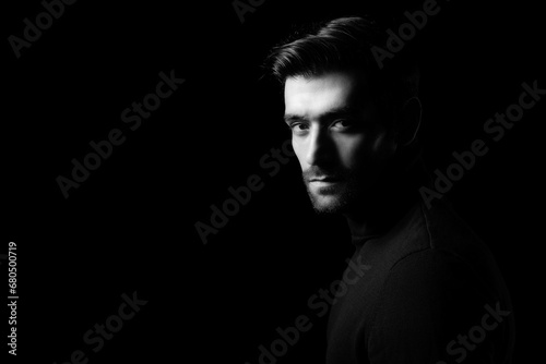 Pride young business man portrait Attractive bearded guy get confident He look at camera Smart man stand in the dark room Confidence Cool man get successful of business Business Fashion concept