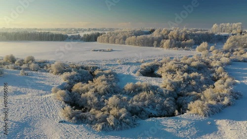 Winter landscape. A frosty day and the trees are covered with frost. Suburb of Europe