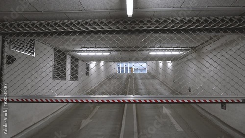 opening a Roller grilles door to leave an underground carpark