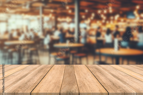 Empty wooden table space platform and blurred restaurant or coffee shop background for product display montage