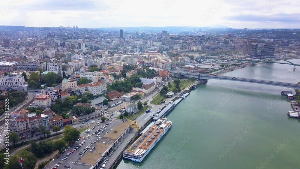 Daytime aerial shot in Belgrade, Serbia. Sava River and general city view