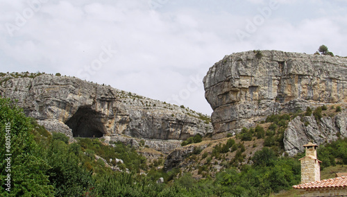 Panoramic view of the mountains and the cave of la Vega del Codorno. 