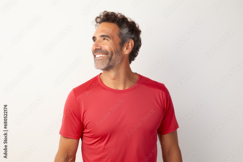 Portrait of a blissful man in his 40s wearing a moisture-wicking running shirt against a white background. AI Generation Portrait of a blissful man in his 40s wearing a moisture-wicking running shirt against a white background. AI Generation