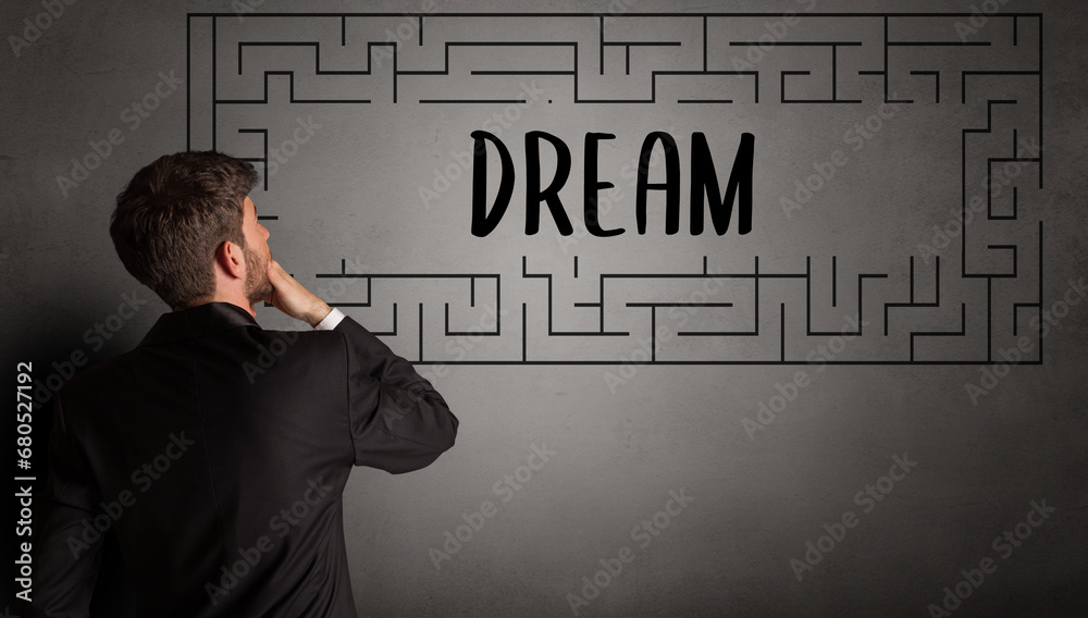 businessman drawing maze concept businessman drawing maze concept