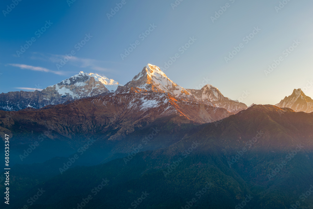 Machapuchhare or Machapuchare mountain peak in the Annapurna range, seen from Poon Hill trek trail in Pokhara, Himalayas, Nepal Machapuchhare or Machapuchare mountain peak in the Annapurna range, seen from Poon Hill trek trail in Pokhara, Himalayas, Nepal