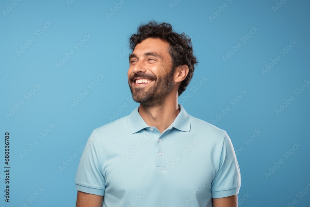 Portrait of a happy man in his 30s wearing a breathable golf polo against a soft blue background. AI Generation Portrait of a happy man in his 30s wearing a breathable golf polo against a soft blue background. AI Generation